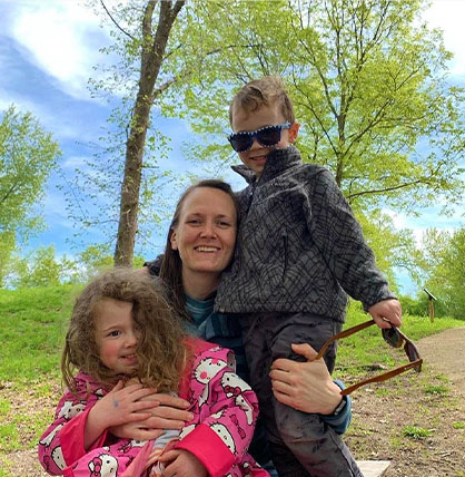 A family posing together in a park